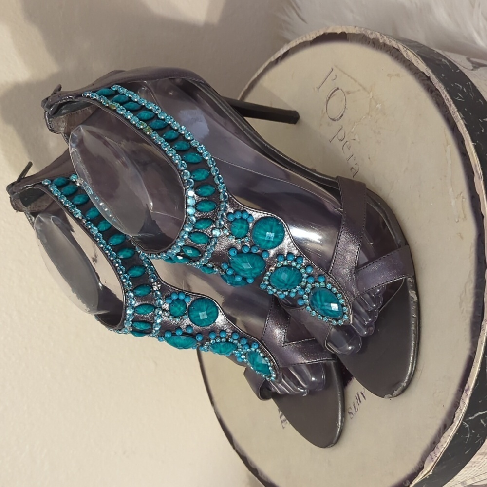- Carlos Santana leather stilettos